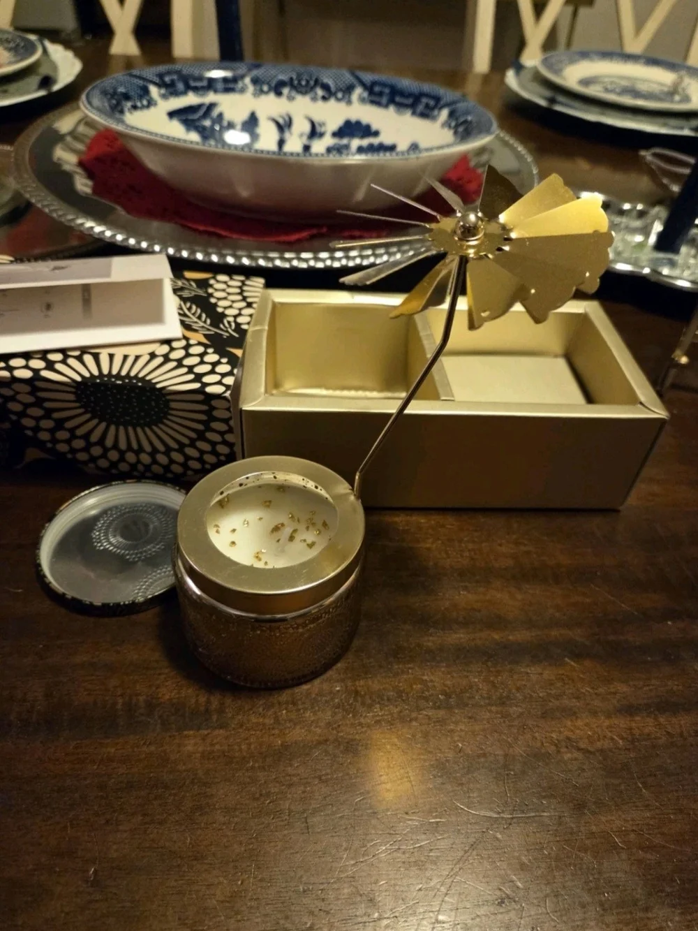 Mecela Golden Spinning Candle Holder, featuring hanging metallic fairies
